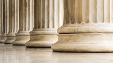 Architectural detail of marble ionic order columns